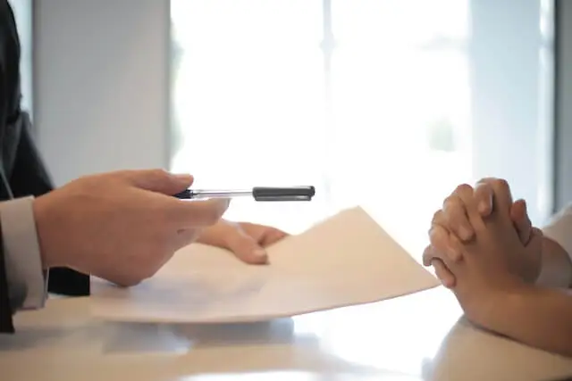 Man giving financial advice to woman